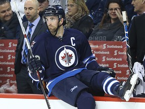 Winnipeg Jets captain Andrew Ladd hops over the boards against the Boston Bruins in Winnipeg on Thu., Feb. 11, 2016. Kevin King/Winnipeg Sun/Postmedia Network