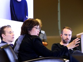 Dr. Angelita Sanchez makes a point at the Bell Let's Talk and NEO Kids discussion on youth mental health as Michael Landsberg and pro golfer Andrew Jensen look on in Sudbury, Ont., on Thursday, February 11, 2016. Gino Donato/Sudbury Star/Postmedia Network