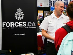 Intelligencer file photo/Tim Miller
Mark Champ, Petty Officer 2nd Class, speaks with students at the Canadian Forces booth at Loyalist College's Career Fair on Feb. 3.