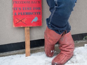 Farmers from the tri-area gathered outside Stony Plain MLA’s office Erin Babcock to protest Bill 6: Enhanced Protection for Farm and Ranch Workers Act by signing a petition against the bill, in Stony Plain on Friday, Dec. 11, 2015.  - File photo