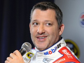 In this Jan. 21, 2016, file photo, Stewart Haas co-owner and driver Tony Stewart talks to members of the media during the NASCAR Charlotte Motor Speedway Media Tour in Charlotte, N.C. (AP Photo/Mike McCarn, File)