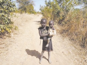 A visit to South Sudan ? Africa?s greatest enigma ? proves an emotional journey for Glen Pearson, Jane Roy and their two adopted daughters. (GLEN PEARSON photo)