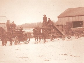 An 1894 image shows steam threshing on the Lieury-area farm of Andrew Brown Erskine. Fans who know of John Cassidy?s canine tales will not be surprised to learn Erskine had a mad dog. (McGillivray Township History Group )