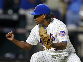 Jenrry Mejia of the New York Mets reacts after defeating the Atlanta Braves on August 26, 2014 at Citi Field in New York City. (Rich Schultz/Getty Images/AFP)