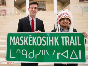 Edmonton Mayor Don Iveson and Enoch Cree Nation Chief Billy Morin pose for a photo following the official announcement of the renaming of 23 Avenue between 215 Street and Anthony Henday to Maskekosihk Trail, during a press conference at City Hall, in Edmonton Alta. on Friday Feb. 12, 2016. Photo by David Bloom