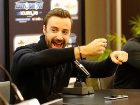 Canadian Indy Car driver James Hinchcliffe at the Indy 500 exhibit at the Canadian Auto Show on Friday Feb. 12, 2016. (Michael Peake/Toronto Sun/Postmedia Network)