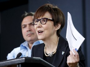 Cindy Blackstock (R), executive director of the First Nations Child and Family Caring Society, speaks during a news conference regarding a ruling by the Canadian Human Rights Tribunal with Assembly of First Nations National Chief Perry Bellegarde in Ottawa on January 26, 2016. REUTERS/Chris Wattie