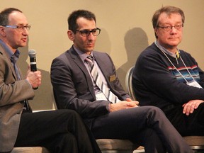 George Mallay speaks at a round table discussion during the recent Sarnia-Lambton Energy Symposium. The Sarnia-Lambton Economic Partnership general manager is pictured with Lambton College's Mehdi Sheikhzadeh, centre, and Ubiquity Solar's Ian MacLellan. (Tyler Kula, The Observer)