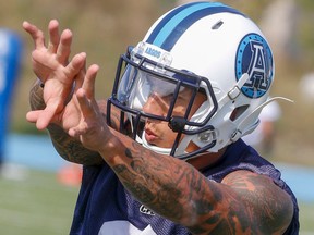 Chad Owens says he feels energized after officially signing with the Tiger-Cats on Friday, Feb. 12, 2016. (Dave Thomas/Toronto Sun/Files)