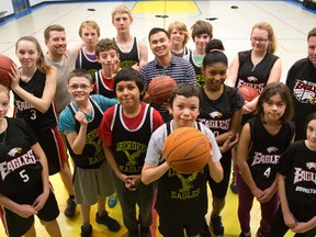 Aberdeen public school coaches Kevin Turcot, top left, Linh Ngo and Rob Tate, right, have turned the Eagles into a force in elementary basketball in London (MIKE HENSEN, The London Free Presss)