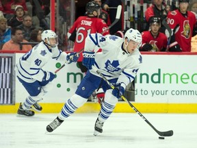 Maple Leafs defenceman Morgan Rielly (44) skates with the puck during second period NHL action against the Senator in Kanata, Ont., on Saturday, Feb. 6, 2016. (Marc DesRosiers/USA TODAY Sports)