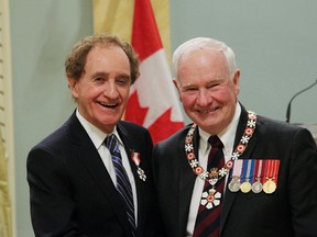 Justin Whaling/For The Sudbury Star
Former Sudbury mayor Jim Gordon receives the Order of Canada from Governor General David Johnston — himself a Sudbury native — during a ceremony at Rideau Hall in Ottawa on Friday.