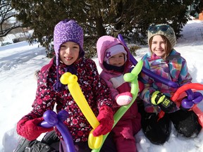 Skylar Pigeon, 10, left, Braelyn Pigeon, 4, and Charlotte Pigeau, 10, show their balloon animals at the Walden Winter Carnival in Lively, Ont. on Saturday February 13, 2016. John Lappa/Sudbury Star/Postmedia Network