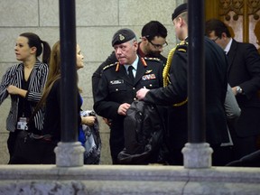 Chief of Defence Staff Jonathan Vance, centre, leaves a Liberal cabinet meeting on Parliament Hill in Ottawa on Tuesday, Feb. 2, 2016. THE