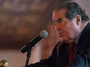 U.S. Supreme Court Justice Antonin Scalia speaks at an event sponsored by the Federalist Society at the New York Athletic Club in New York Oct. 13, 2014. REUTERS/Darren Ornitz