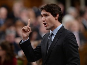 Prime Minister Justin Trudeau responds to a question during question period in the House of Commons on Parliament Hill in Ottawa on Tuesday, Feb. 2, 2016.