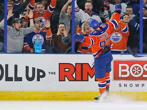 Edmonton Oilers forward Connor McDavid (97) celebrates his third period goal against the Toronto Maple Leafs at Rexall Place. (Perry Nelson-USA TODAY Sports)