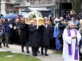 The coffin of Italian student Giulio Regeni is carried during his funeral in Fiumicello, northern Italy, February 12, 2016. Italy demanded on Monday that Egypt catch and punish those responsible for the death of Regeni, whose body found tortured by a roadside in Cairo, and the Egyptian government dismissed suggestions its security services could have been involved. REUTERS/Stringer