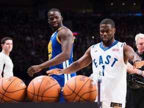 Actor Kevin Hart, right, competes during the NBA all-star skills competition in Toronto on Saturday, February 13, 2016. (THE CANADIAN PRESS/Mark Blinch)