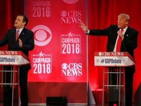 Republican U.S. presidential candidates Senator Ted Cruz (L) and businessman Donald Trump directly debate each other at the Republican U.S. presidential candidates debate sponsored by CBS News and the Republican National Committee in Greenville, South Carolina February 13, 2016.  REUTERS/Jonathan Ernst (TPX IMAGES OF THE DAY)