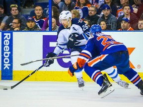 Winnipeg Jets right wing Blake Wheeler (26) controls the puck against the Edmonton Oilers during the third period at Rexall Place. Winnipeg won 2-1. (Sergei Belski-USA TODAY Sports)
