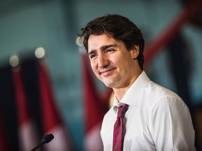 Prime Minister Justin Trudeau speaks to media about his first 100 days in office and announces the expansion of the Canada Summer Jobs Program at the Dovercourt Boys and Girls Club in Toronto on Friday, February 12, 2016. THE CANADIAN PRESS/Aaron Vincent Elkaim