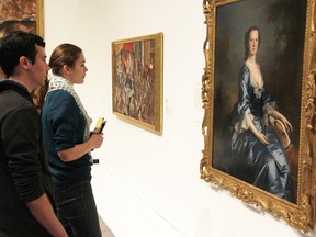 Rose Bullock of Alma, Ont., and Mason Misener of Holstein, Ont., both 17, view a portrait of Victoria Kynaston by Allan Ramsay at the Judith and Norman Alix Art Gallery Monday. It was the last day for the gallery's Masterworks of the Beaverbrook Art Gallery exhibition that's attracted about 18,000 viewers in its four months in Sarnia. (Tyler Kula, The Observer)