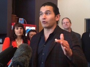 Indigenous author and broadcaster Wab Kinew speaks to supporters in Winnipeg Tuesday, Feb.2, 2016. Kinew announced he is running for the NDP in the Manitoba election slated for April 19. THE CANADIAN PRESS/Steve Lambert