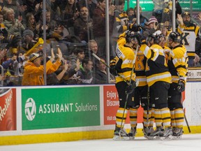 Kingston Frontenacs celebrate their first goal of the game, by Juho Lammikko in the first period, against the Barrie Colts during Ontario Hockey League action at the Rogers K-Rock Centre on Monday. (Julia McKay/The Whig-Standard)