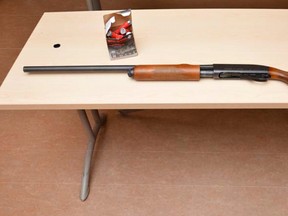 This stolen shotgun was recovered from a woman's home in Kingston's west end on Sunday night. (Kingston Police handout photo)