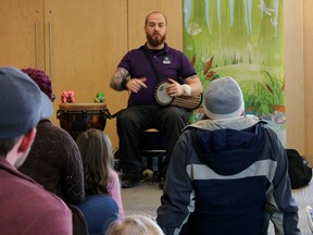 Josh Issenman, of Mystic Drumz, performs as part of Black History Month at the Calvin Park branch of the Kingston Frontenac Public Library on Saturday. (Steph Crosier/The Whig-Standard)