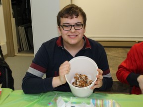 Dominic Belisle destroyed his competition eating almost twice as much chicken as last year when he first won his title.