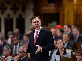 Minister of Finance Bill Morneau responds to a question during question period in the House of Commons on Parliament Hill in Ottawa on Tuesday, Feb. 16, 2016. (THE CANADIAN PRESS/Sean Kilpatrick)