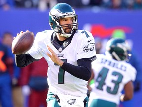 Philadelphia Eagles quarterback Sam Bradford (7) throws the ball against the New York Giants during the first quarter at MetLife Stadium. Brad Penner-USA TODAY Sports