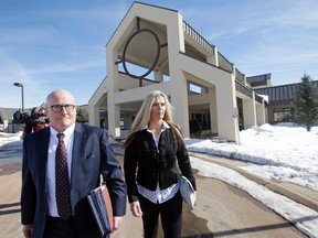 Olympic gold-medal skier Picabo Street leaves the Summit County Justice Center with her attorney Joe Wrona in Park City, Utah, on Tuesday, Feb. 16, 2016. Street appeared in court on misdemeanour domestic violence and assault charges. (Rick Bowmer/AP Photo)