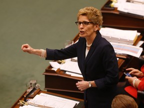 Ontario Premier Kathleen Wynne speaks at the opening of the legislature on Tuesday, February 16, 2016. (Jack Boland/Toronto Sun)
