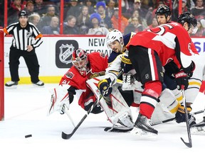 Senators goaltender Craig Anderson follows the puck as Brian Gionta of the Sabres tries to score during second period NHL action at Canadian Tire Centre in Ottawa on Tuesday, Feb. 16, 2016. (Jean Levac/Postmedia Network)