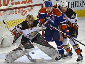 Taylor Hall crashes the Anaheim net during the second period in Tuesday's game at Rexall Place. (Ed Kaiser)
