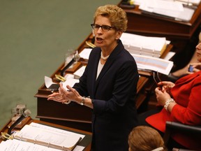 Ontario Premier Kathleen Wynne speaks to the Speaker at the opening of the Legislature on Tuesday February 16, 2016. Jack Boland/Toronto Sun/Postmedia Network