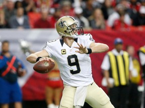 New Orleans Saints quarterback Drew Brees (9) attempts a pass in the third quarter against the Atlanta Falcons at the Georgia Dome. The Saints won 20-17. Jason Getz-USA TODAY Sports