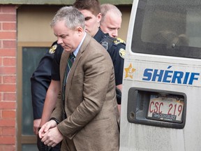 Dennis Oland arrives for his bail hearing at the Court of Appeal in Fredericton, N.B. on Wednesday, Feb. 17, 2016. (THE CANADIAN PRESS/Andrew Vaughan)