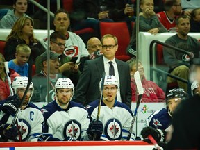 Winnipeg Jets head coach Paul Maurice looks on from behind the bench against the Carolina Hurricanes at PNC Arena on Tuesday night. Maurice wasn't pleased with his team's effort. (James Guillory-USA TODAY Sports)