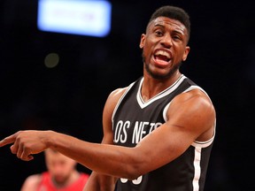 Brooklyn Nets power forward Thaddeus Young reacts after being called for an offensive foul against the Toronto Raptors during the first quarter at Barclays Center in Brooklyn on Jan. 6, 2016. (Brad Penner/USA TODAY Sports)