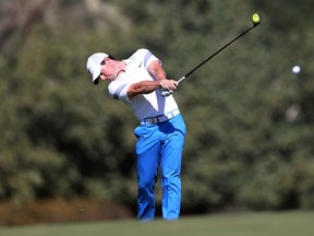 Rory McIlroy plays a shot on the 3rd hole during the third round of the Dubai Desert Classic in Dubai, United Arab Emirates, on Feb. 6, 2016. (Kamran Jebreili/AP Photo)