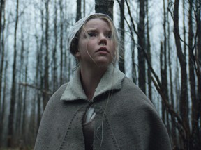 This photo provided by courtesy of A24 shows Anya Taylor-Joy as Thomasin  in a scene from the film, "The Witch." (Rafy/A24)