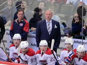Montreal Canadiens coach Michel Therrien looks on from the bench during a game against the Colorado Avalanche Wednesday at the Pepsi Center. (Ron Chenoy/USA TODAY Sports)