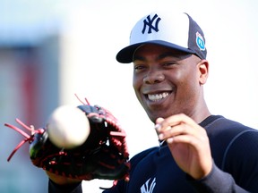 New York Yankees relief pitcher Aroldis Chapman works out as the pitchers and catchers arrive for spring training Thursday at George M. Steinbrenner Field. (Kim Klement/USA TODAY Sports)
