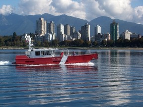 A Canadian Coast Guard vessel is seen on English Bay in Vancouver, B.C., on Tuesday September 22, 2015. THE CANADIAN PRESS/Darryl Dyck