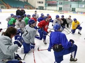 The Sudbury Nickel Capital Wolves players get instruction from coaching staff during practice at Gerry McCrory Countryside Sports Complex on Thursday evening. The Nickel Caps begin their GNML semifinals this weekend.