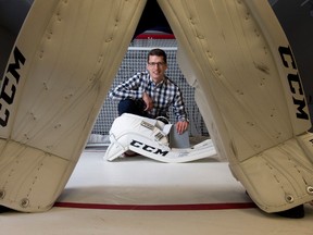 Western University PhD candidate Ryan Frayne aims to help hockey goaltenders stop a few more pucks going between their pads, by researching how the pads are affixed to goalies? legs, and improving the gear?s impact on the player?s body. He?s seen here at Western?s Wolf Orthopedic Biomechanics Lab at the Fowler Kennedy Sport Medicine Clinic in London. (CRAIG GLOVER, The London Free Press)
